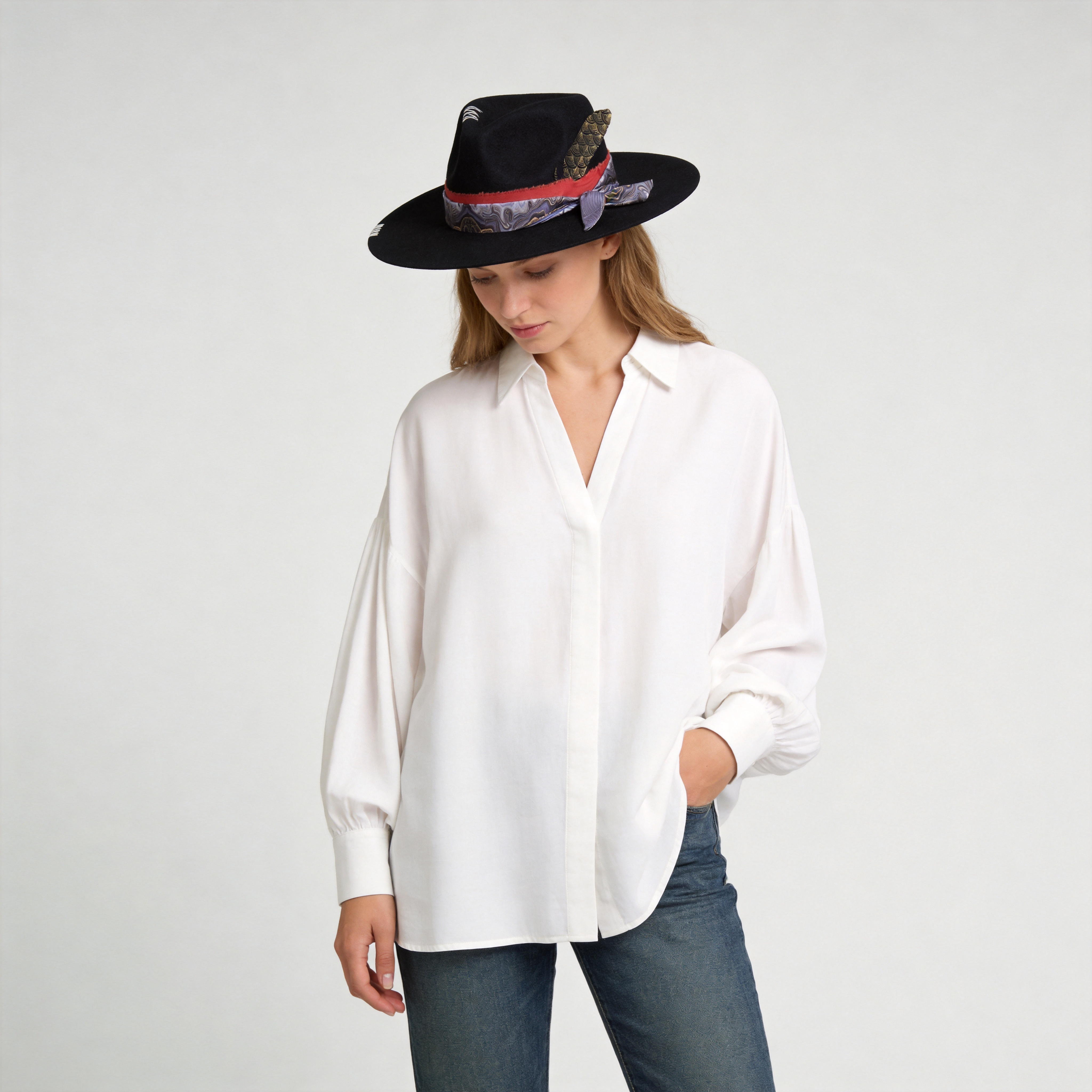 Statement Felt Hat: Feather and Stitch Detail