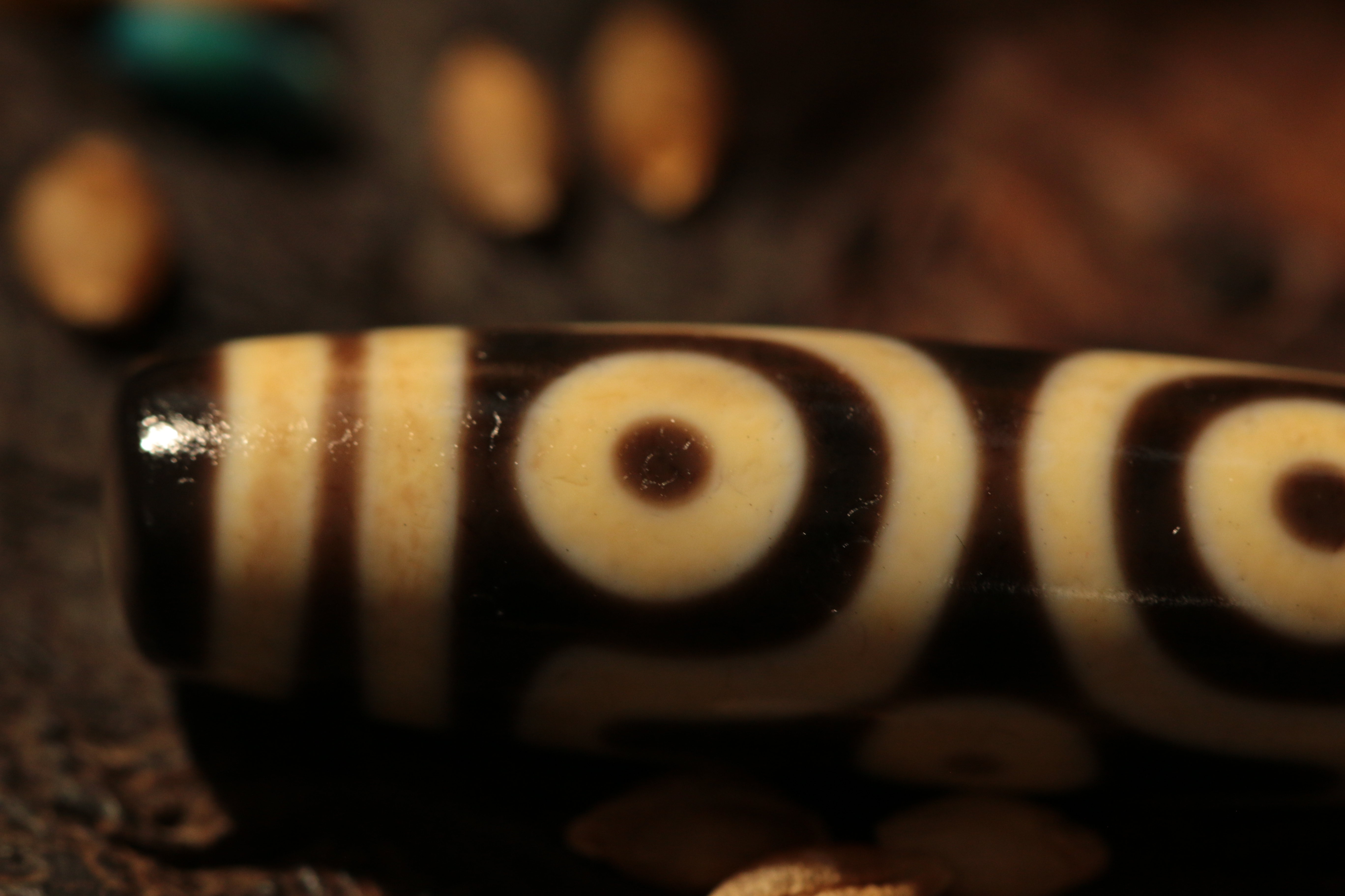 A Tibetan heirloom, the Six-Eyed Dzi Bead（Unique ID: tz-3-2370）