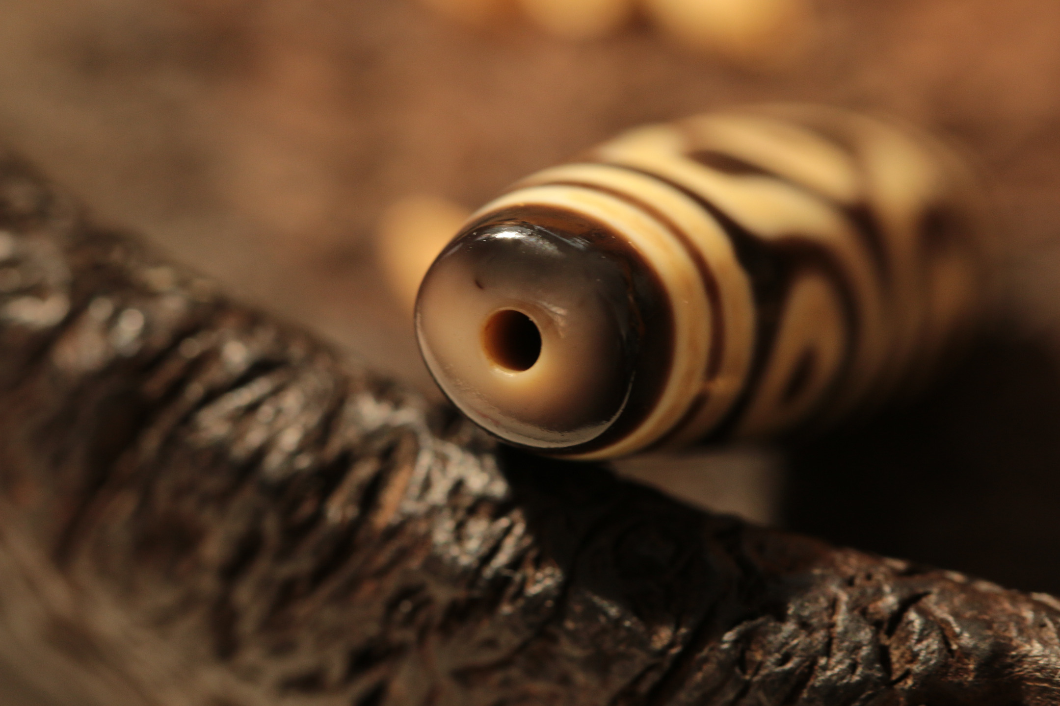 A Tibetan heirloom, the Six-Eyed Dzi Bead（Unique ID: tz-3-2370）