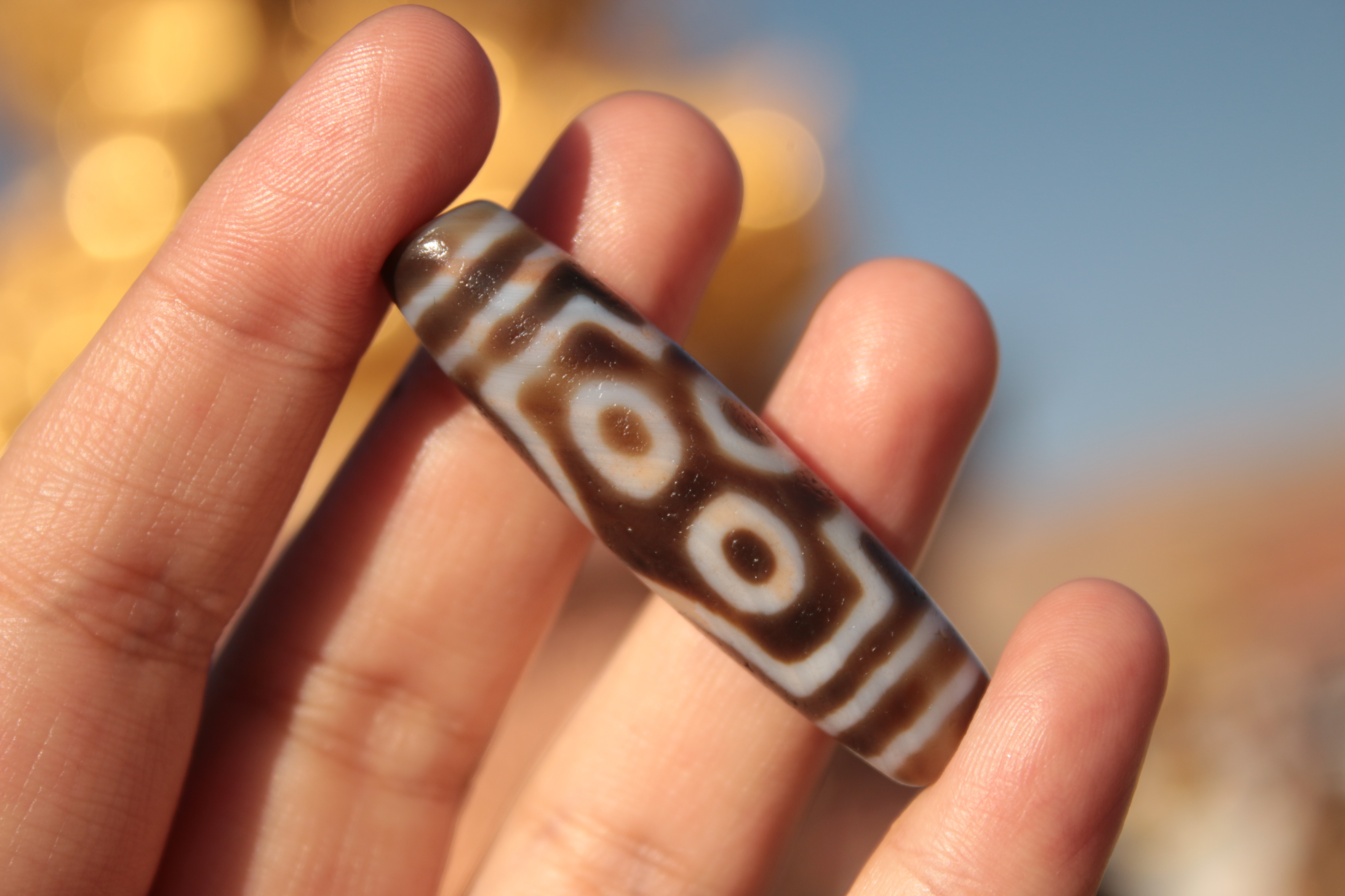 Tibetan Seven-Eyed Dzi Bead（Unique ID: tz-7-0733）