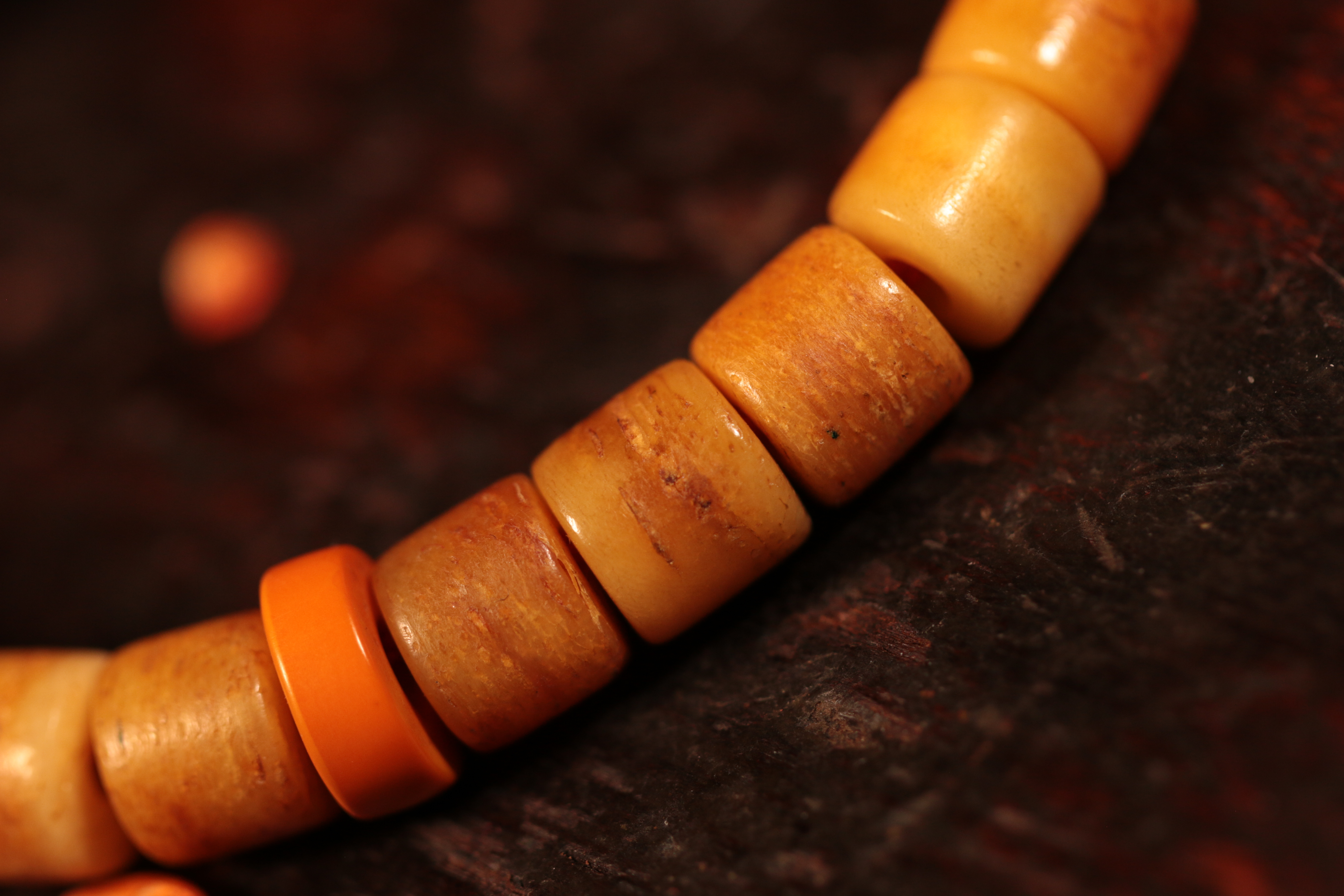 Linggu, holding a Heaven and Earth Dzi Bead bracelet.（Unique ID:cp-1-6428）