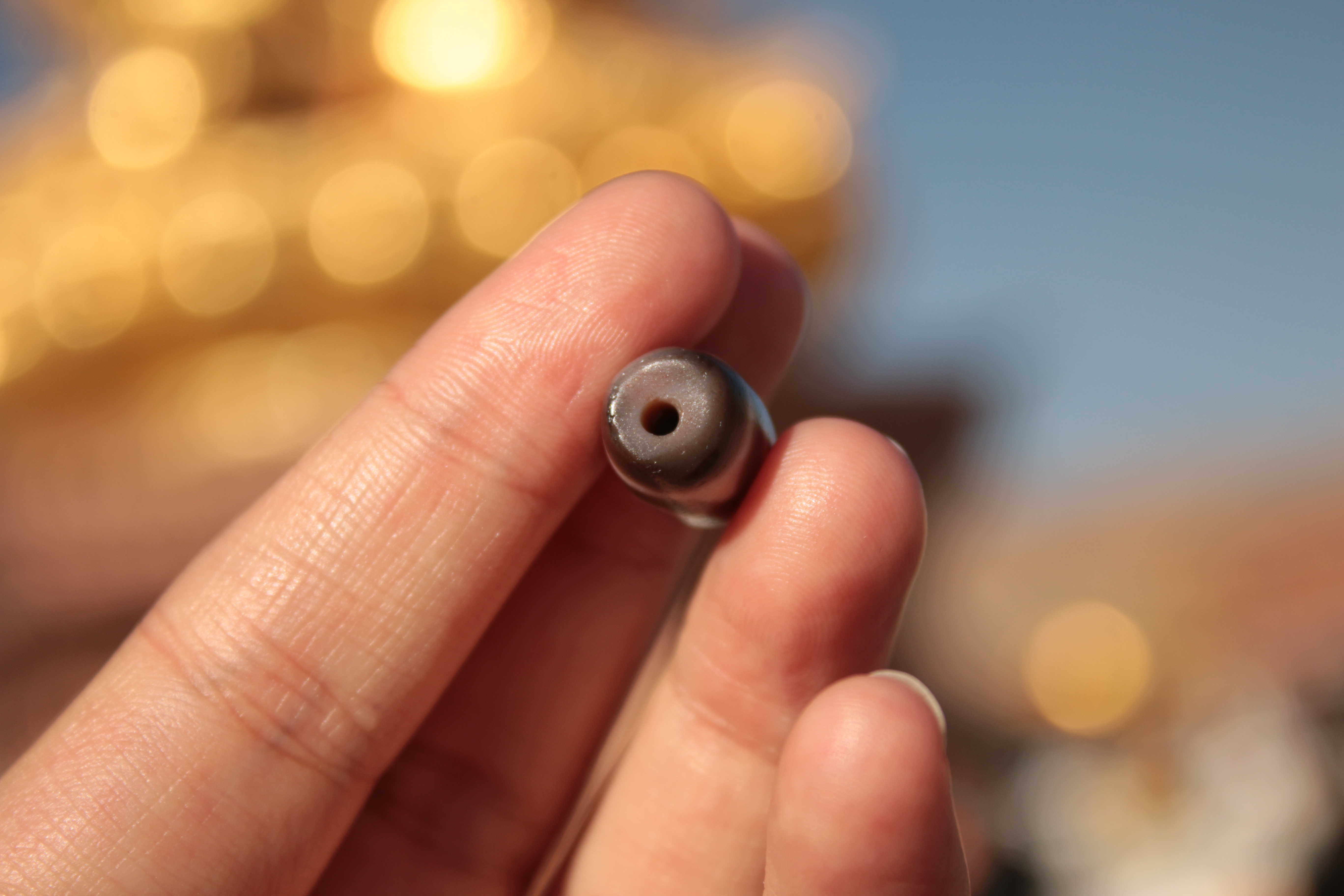 A Tibetan heirloom: Cinnabar Panda Three-Eyed Dzi Bead（Unique ID: tz-3-2370）