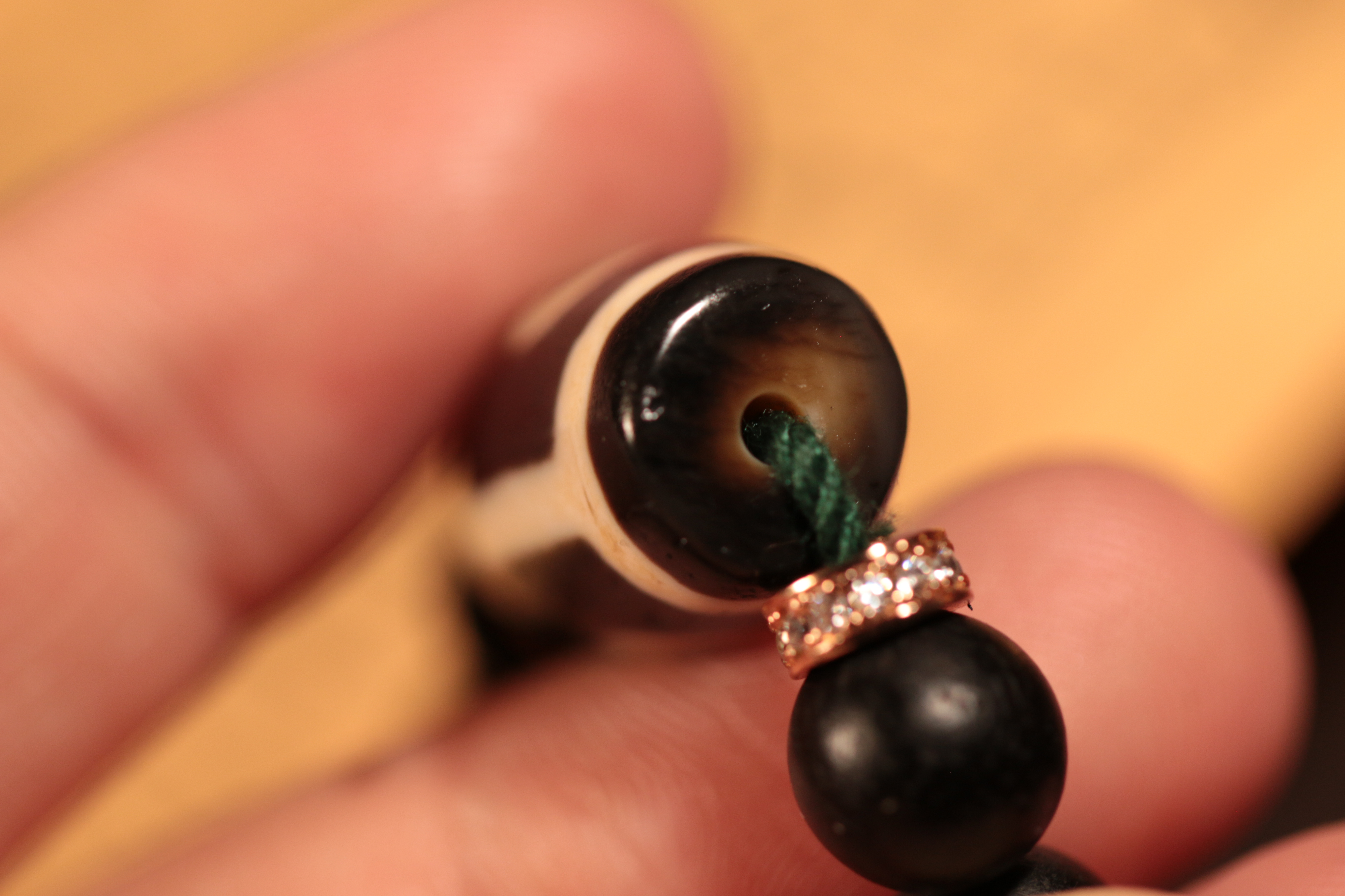 Tibetan sacred object - Two-eyed dzi bead sandalwood handheld charm（Unique ID: cp-1-5991）