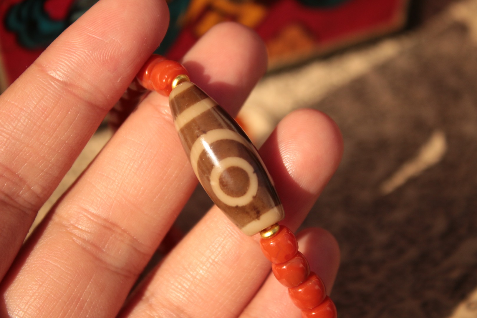 Tibetan sacred object - Two-eyed dzi bead and red agate bracelet（Unique ID: cp-1-3573）