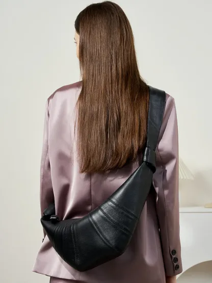 法國小衆頭層小羊皮可頌包斜跨慵懶感牛角包真皮單肩斜跨餃子包女