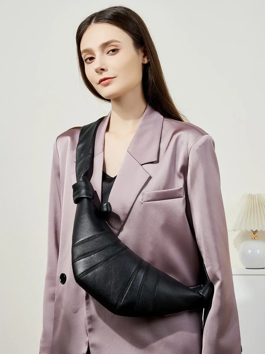 法國小衆頭層小羊皮可頌包斜跨慵懶感牛角包真皮單肩斜跨餃子包女