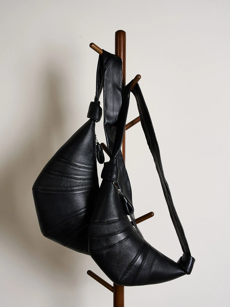 法國小衆頭層小羊皮可頌包斜跨慵懶感牛角包真皮單肩斜跨餃子包女