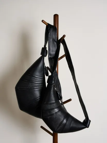 法國小衆頭層小羊皮可頌包斜跨慵懶感牛角包真皮單肩斜跨餃子包女