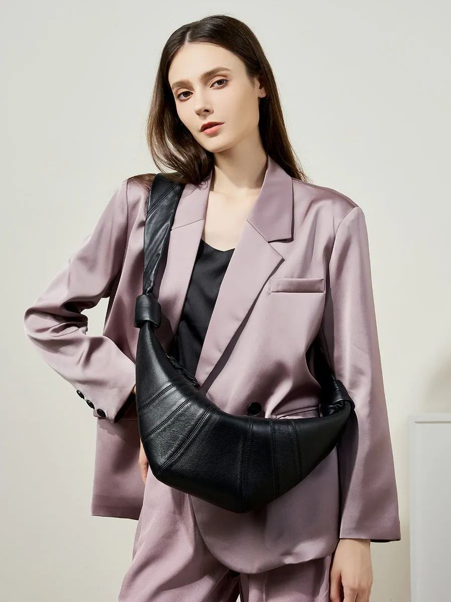 法國小衆頭層小羊皮可頌包斜跨慵懶感牛角包真皮單肩斜跨餃子包女