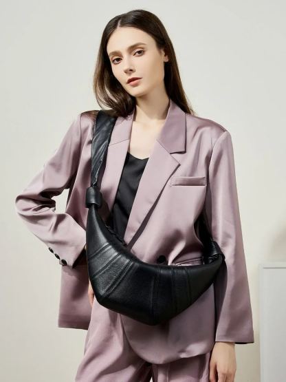 法國小衆頭層小羊皮可頌包斜跨慵懶感牛角包真皮單肩斜跨餃子包女