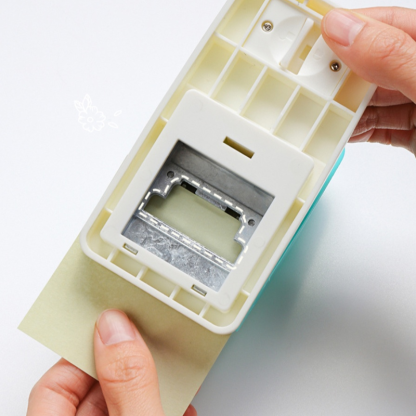 เครื่องติดฉลากดัชนีและเจาะรูแบบทำเอง