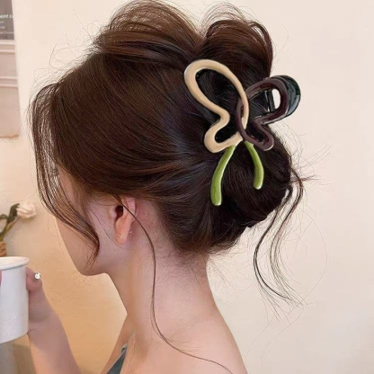 Blue polka dot bow shark clip