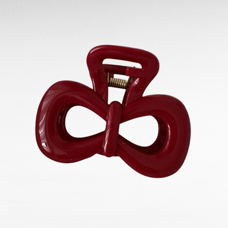 Blue polka dot bow shark clip