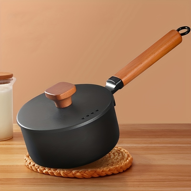 Small milk pot with wooden handle