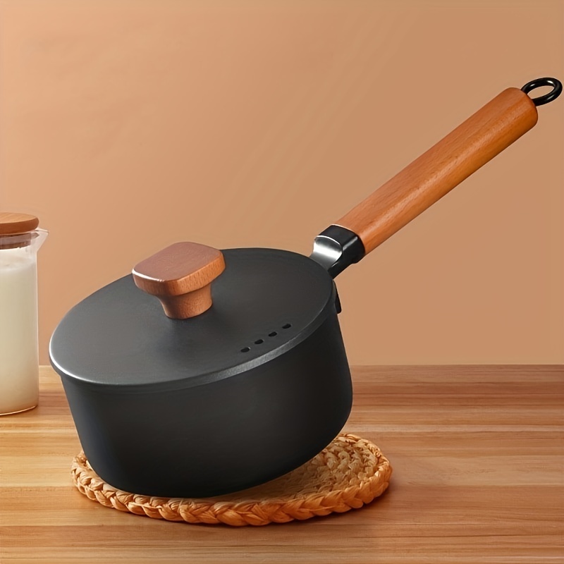 Small milk pot with wooden handle