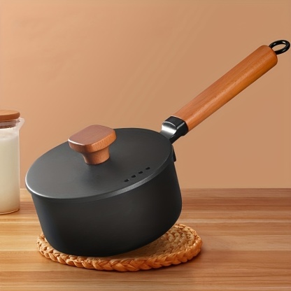 Small milk pot with wooden handle