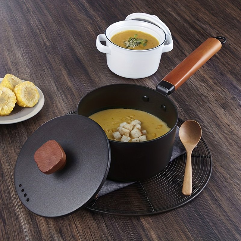 Small milk pot with wooden handle