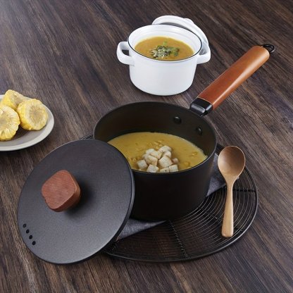 Small milk pot with wooden handle