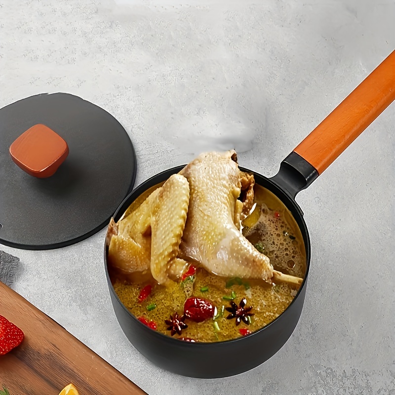 Small milk pot with wooden handle