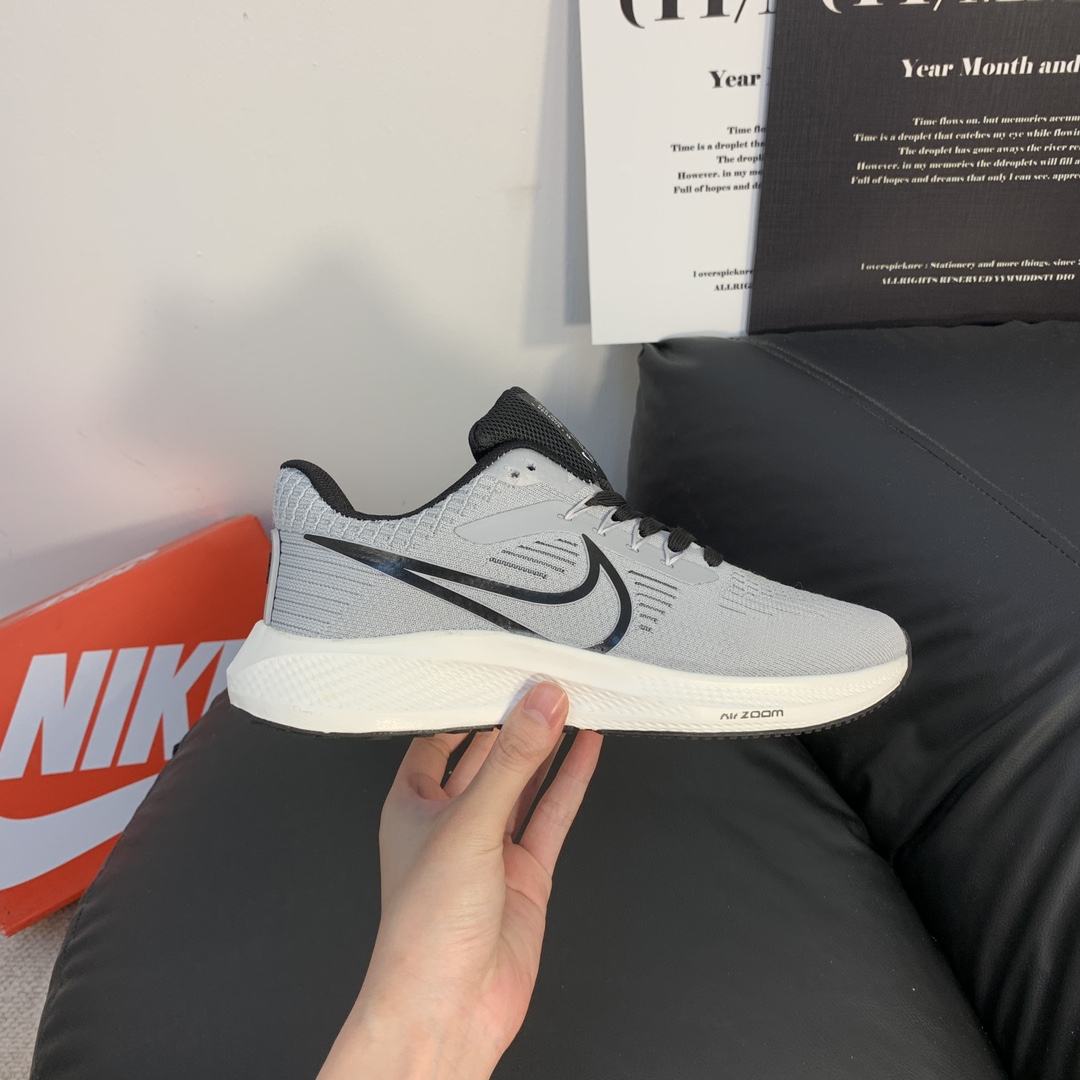 Nike Air Zoom Pegasus 39 Cushioned Running Shoes for Men and Women, featuring shock absorption, breathable mesh upper, and casual design.