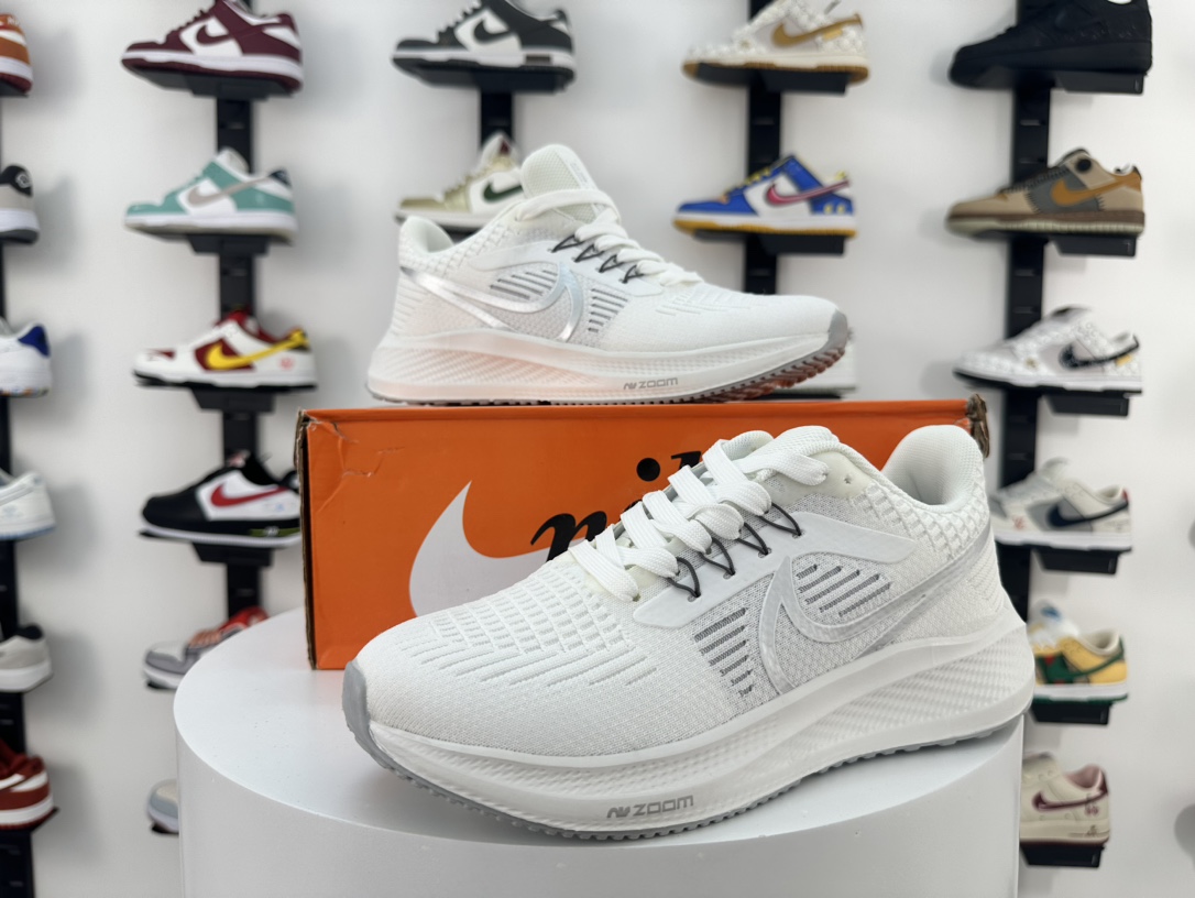 Nike Air Zoom Pegasus 39 Cushioned Running Shoes for Men and Women, featuring shock absorption, breathable mesh upper, and casual design.