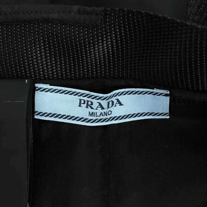 PRADA / プラダ | 2021AW | トライアングル 三角ロゴ プリーツドッキング ベルテッドスカート | 40 | レディース