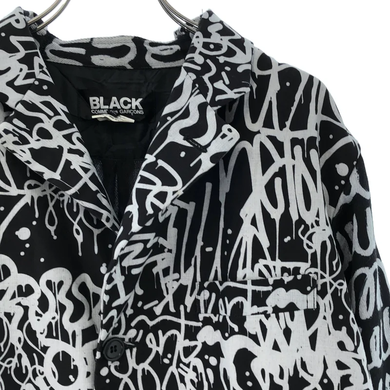BLACK COMME des GARCONS / ブラックコムデギャルソン | 2019AW | グラフィティ 総柄 断ち切り チェスターコート | XL | メンズ