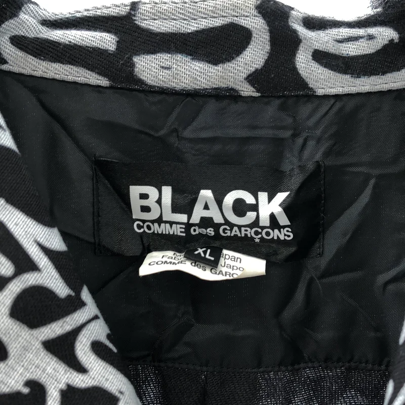 BLACK COMME des GARCONS / ブラックコムデギャルソン | 2019AW | グラフィティ 総柄 断ち切り チェスターコート | XL | メンズ