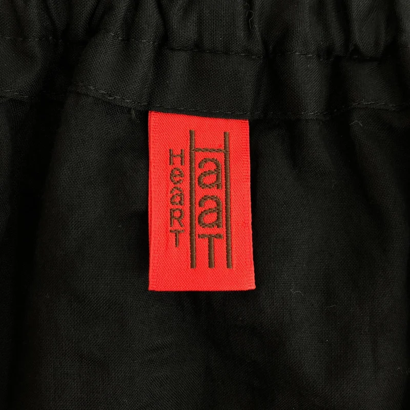 HaaT ISSEY MIYAKE / ハートイッセイミヤケ | コットン 刺しゅう トライバル 総柄 ラップスカート | 2 | レディース