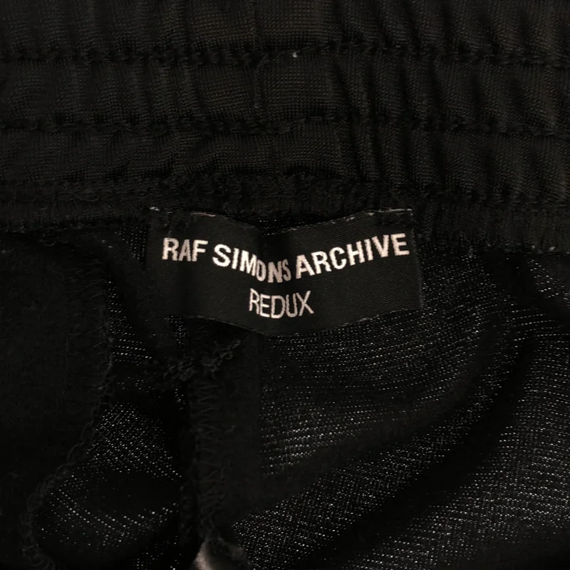 RAF SIMONS ARCHIVE REDUX / ラフシモンズアーカイヴレダックス | カットオフ サイドライン ジャージ トラックパンツ | XS | メンズ