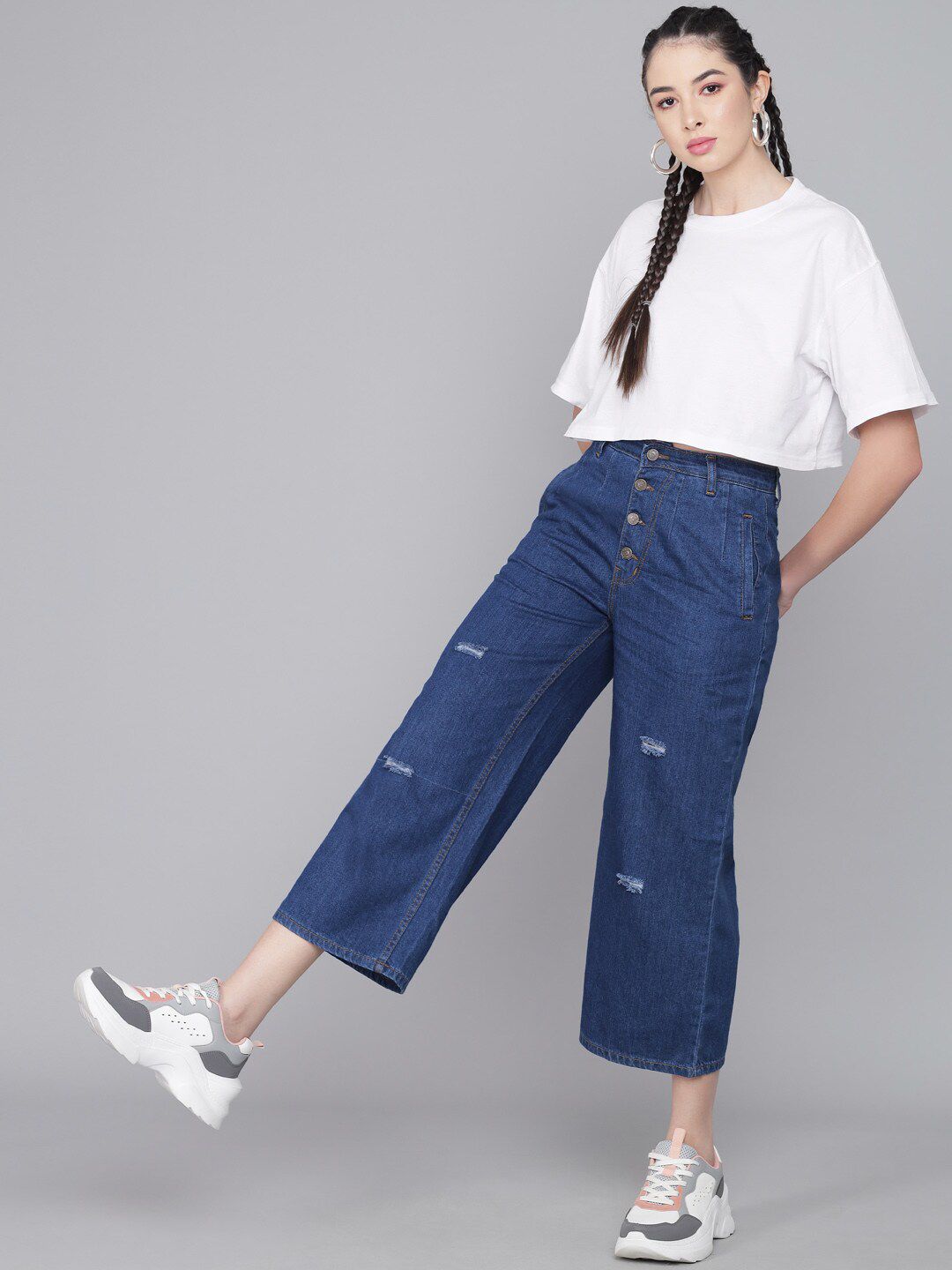 Kotty Women Blue Flared High-Rise Mildly Distressed Jeans