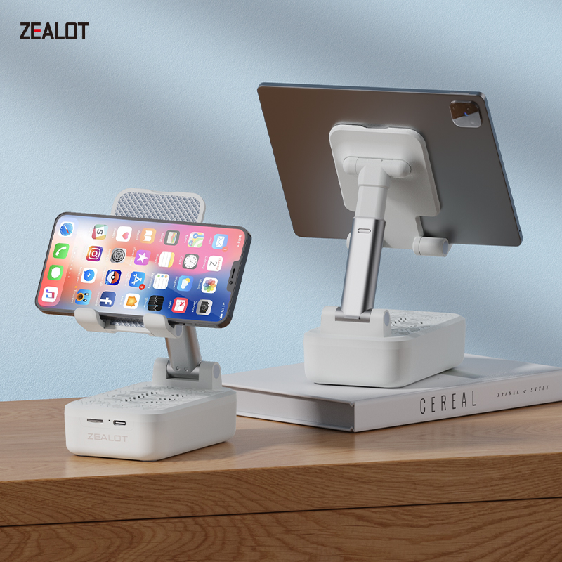 Mobile phone holder with wireless induction bluetooth speaker