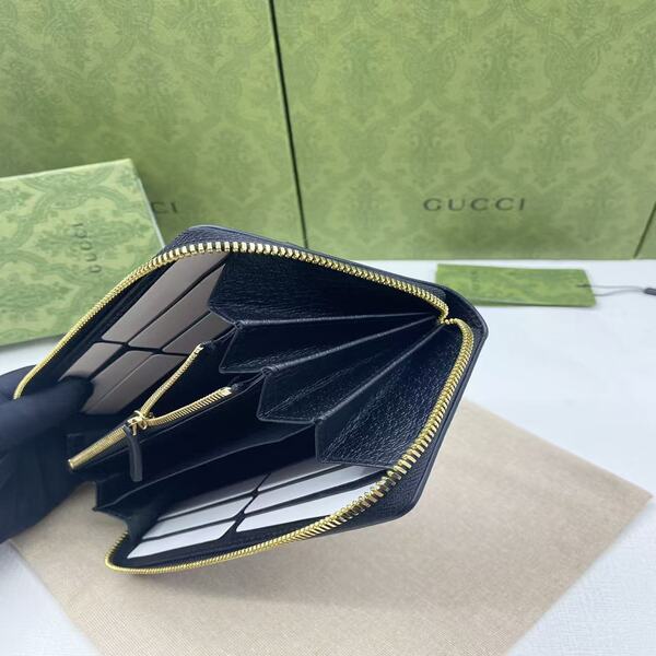 GUCCI GG キャンバス × レザー ラウンドファスナー長財布