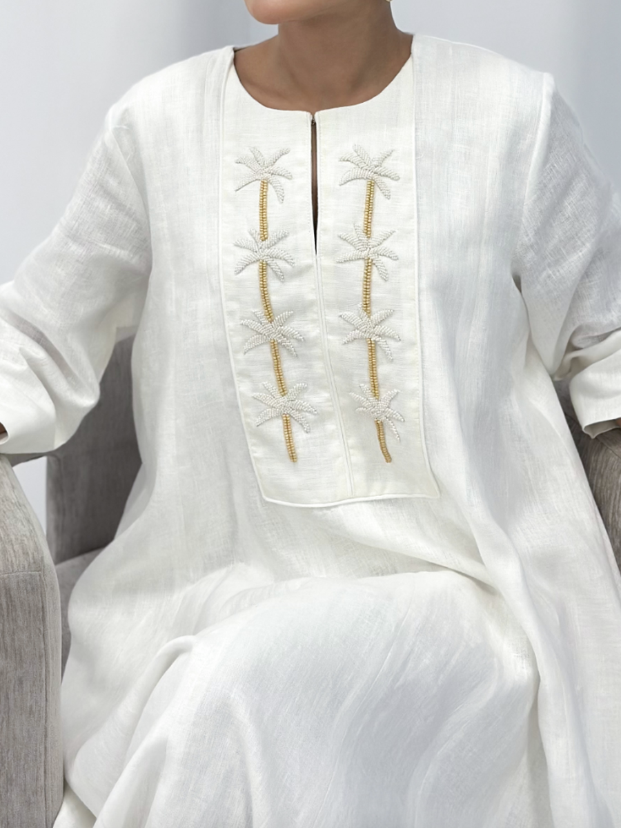 Elegant white linen embroidered dress