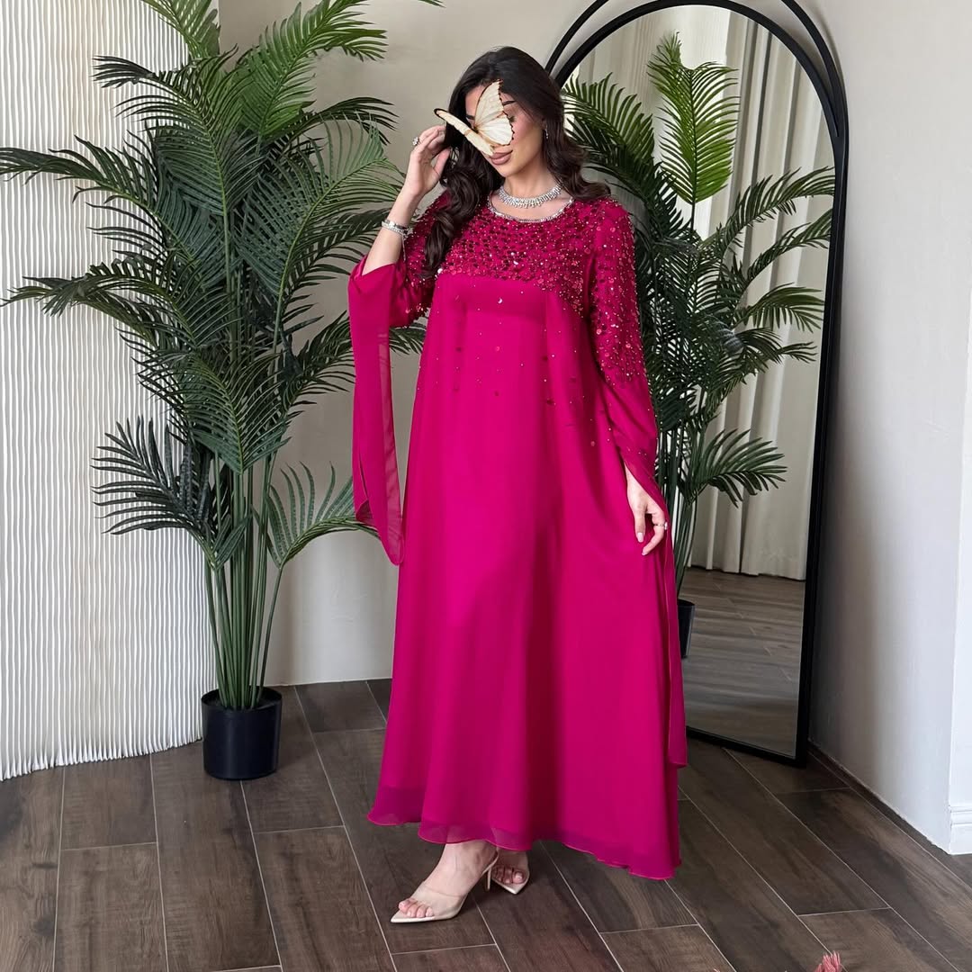 Elegant fuchsia sequined evening dress