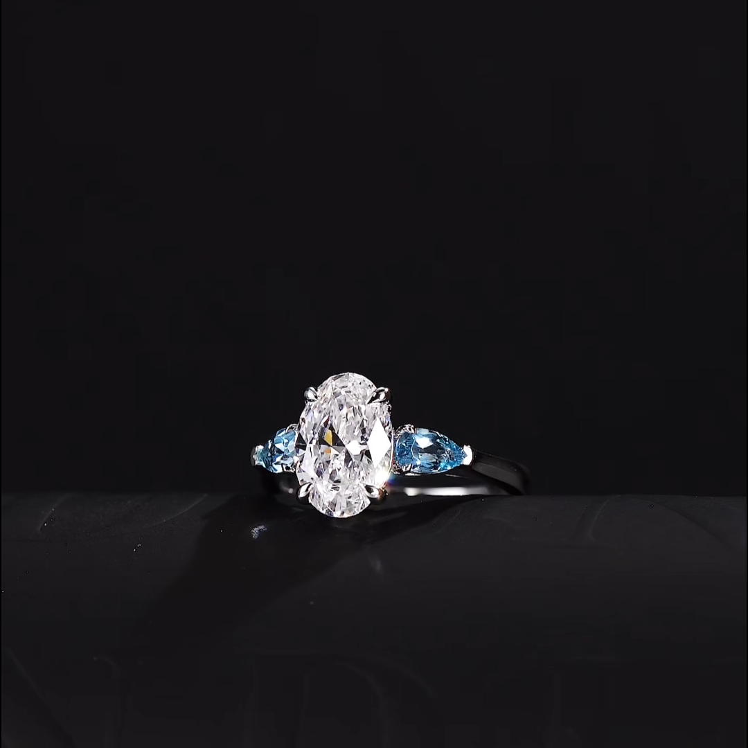 Luneria Rosa — Oval Lab Diamond & Blue Sapphire Three-Stone Ring