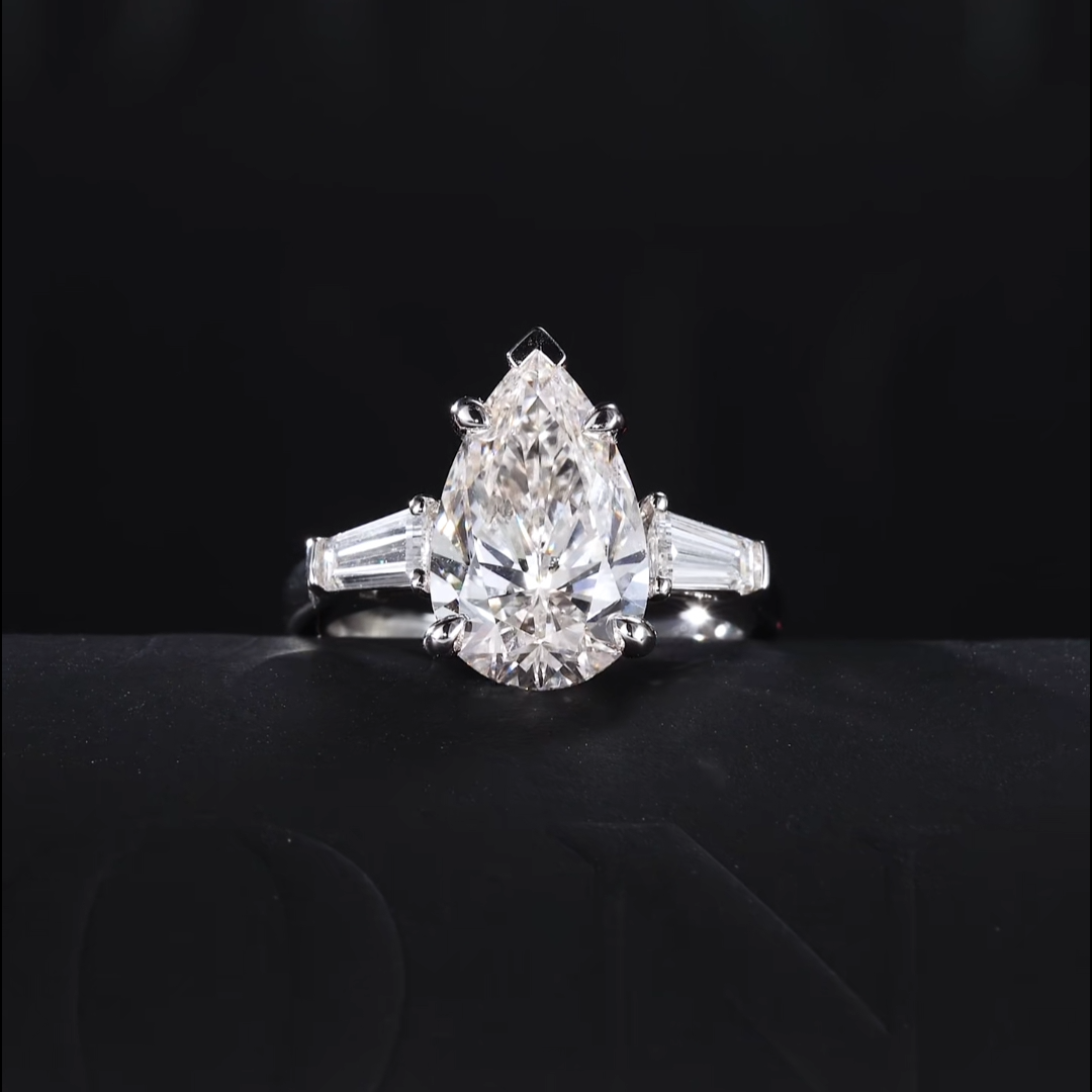  Luneria Arc — White Pear Lab Diamond Tapered Baguette Three-Stone Ring