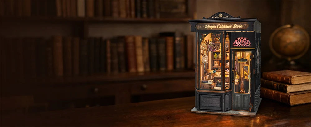 Finished miniature displayed beside books
