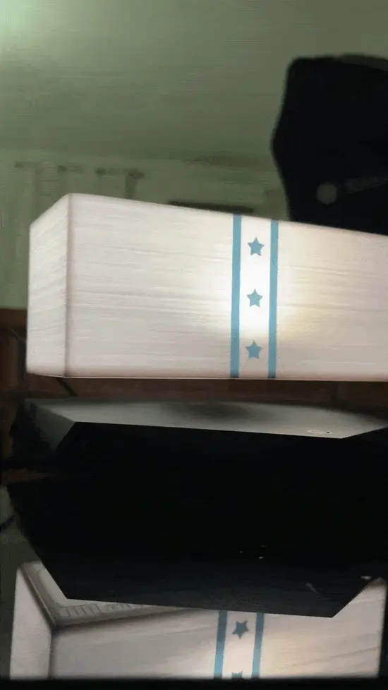Animated close-up of the cash-stack display hovering above the base