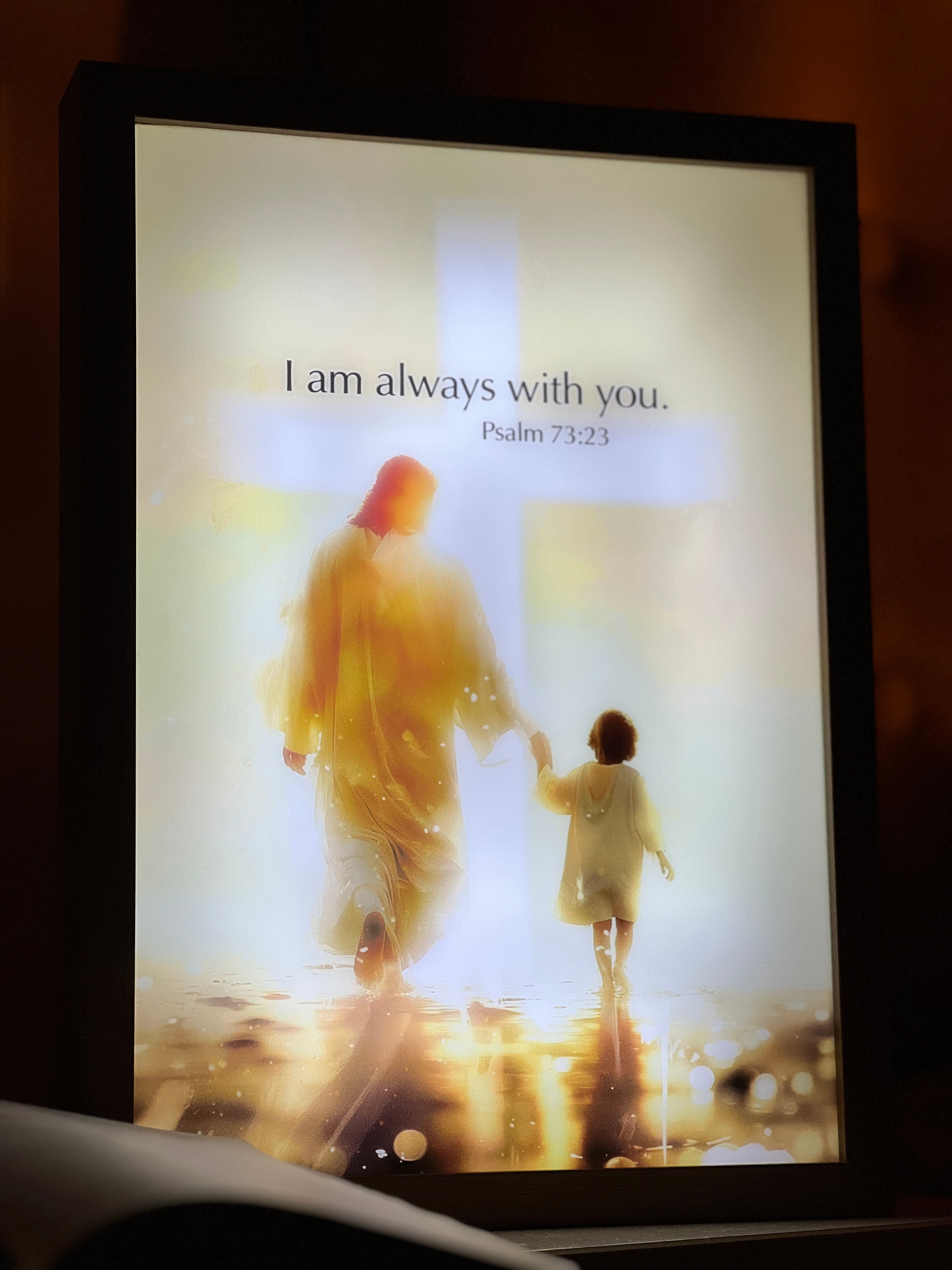 Illuminated Christian frame in a room