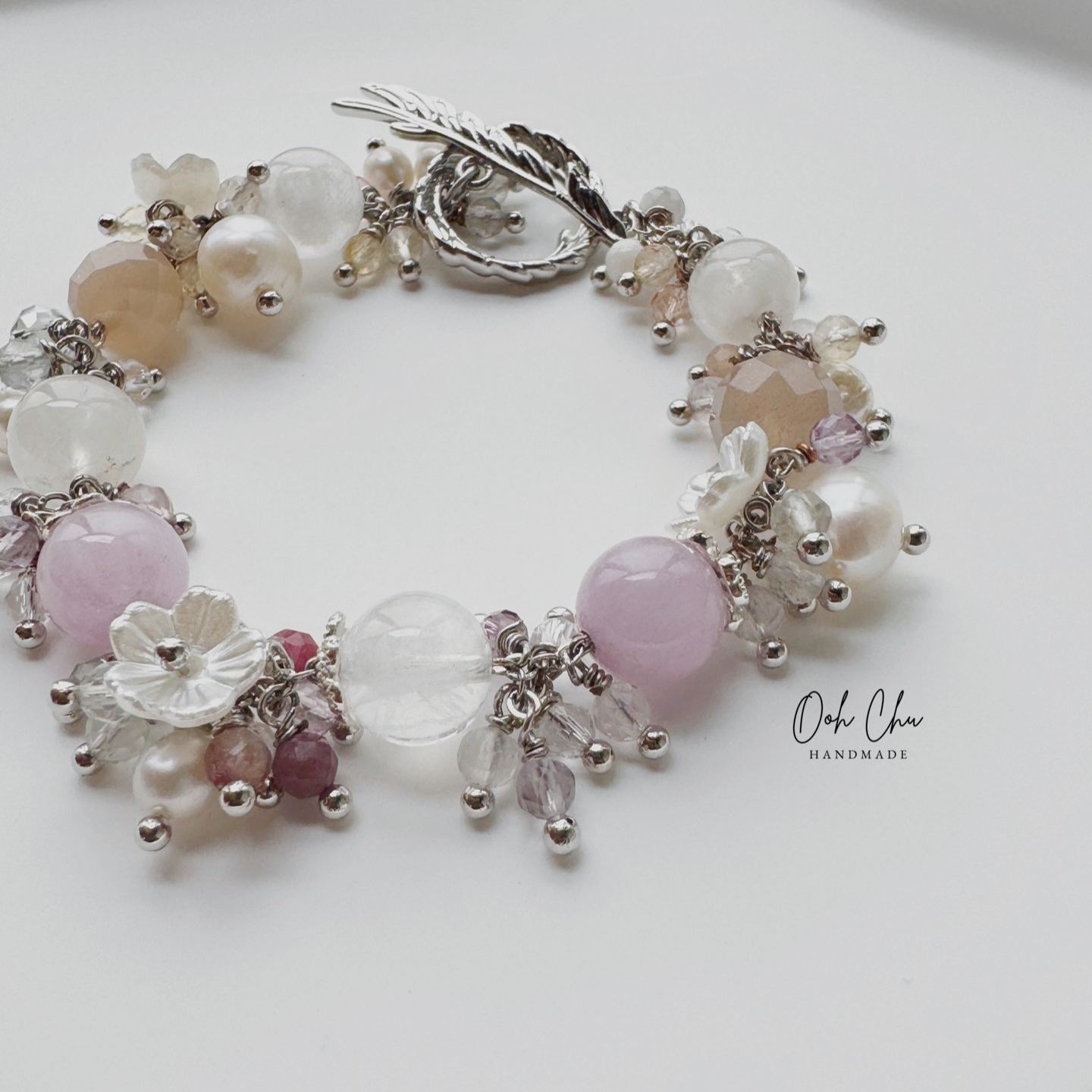 lavender pink gemstone jewelry reflecting light indoor and sunlight soft glowing aesthetic