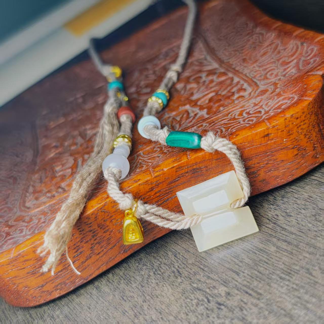 15558和田玉工字佩手工麻绳多宝挂链 Hetian Jade Gong-shaped Pendant Handmade Hemp Rope Multi-gem Hanging Necklace.