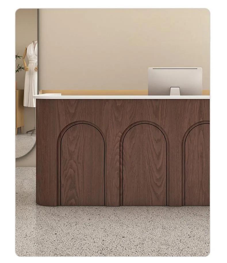 Wood-look reception desk with arched front detail