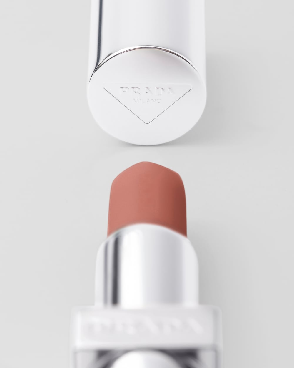 プラダ Optimizing Care lip balm - U010 - MAPLE