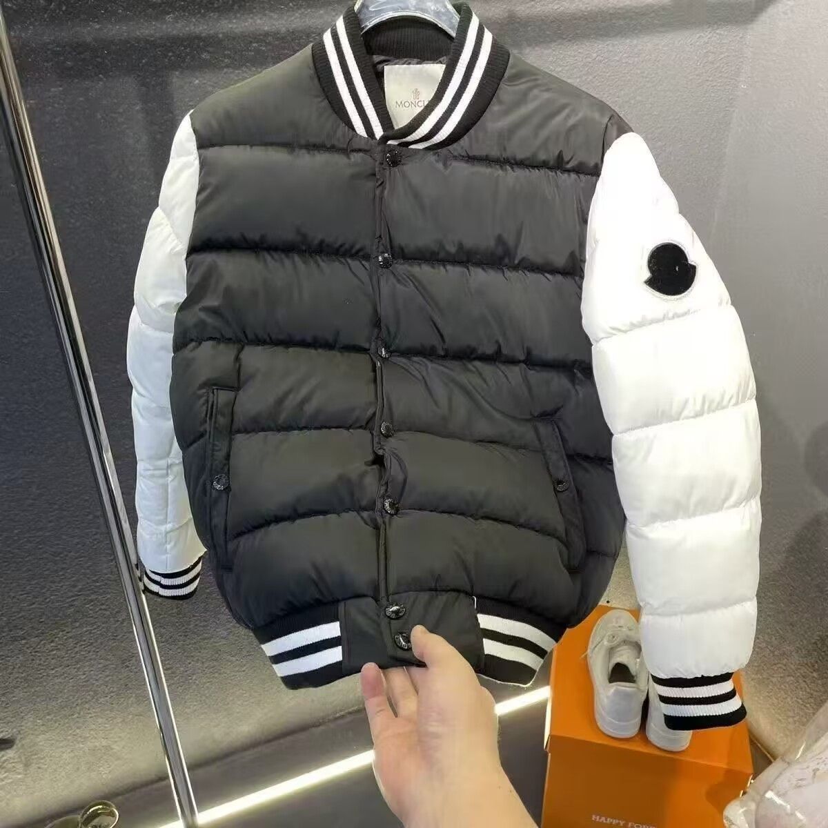 冬のダウン綿ジャケット新型孟佳カジュアルつなぎ合わせ暖かいカップル厚手