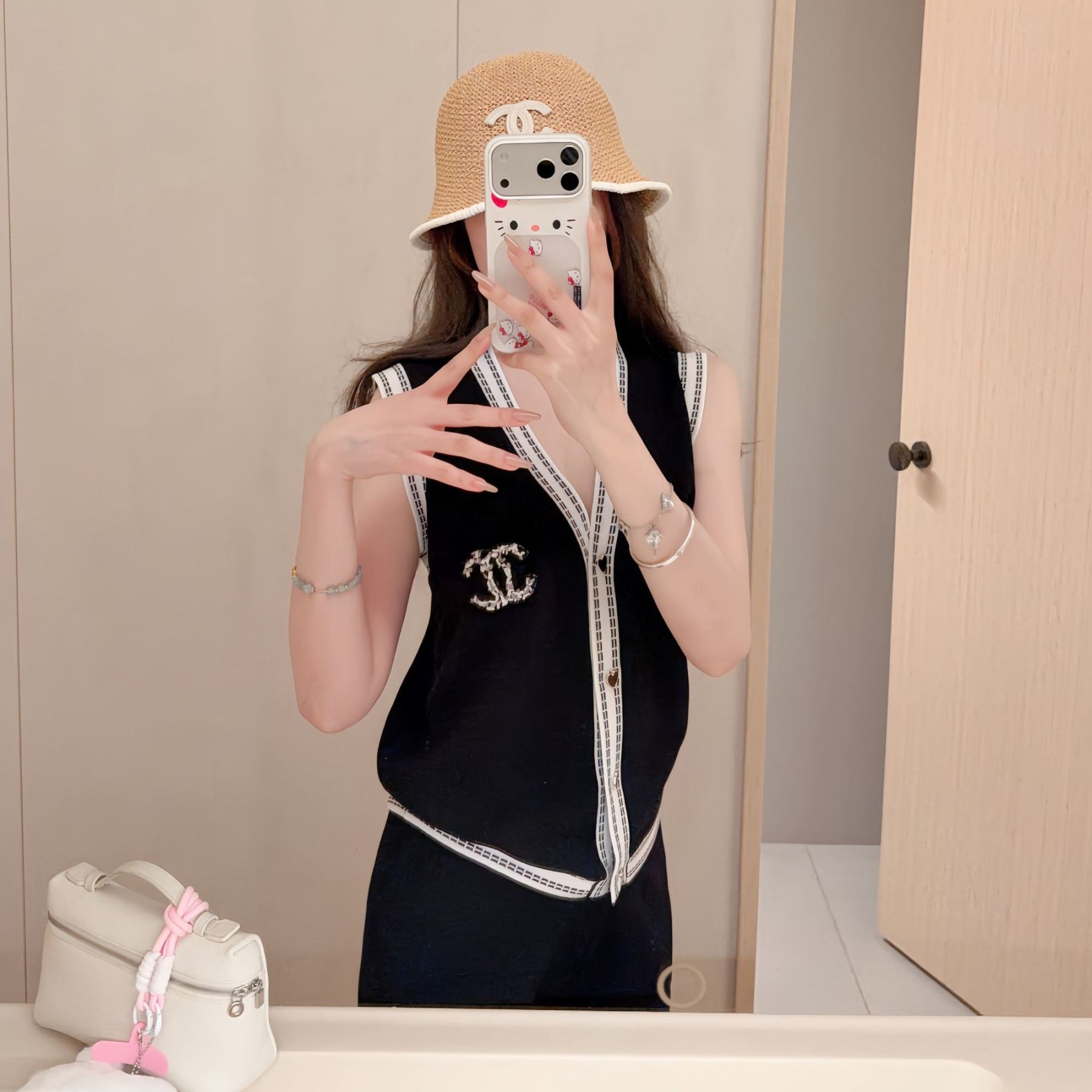 スタイリッシュなニットノースリーブトップスとワイドレッグパンツのツーピースセット