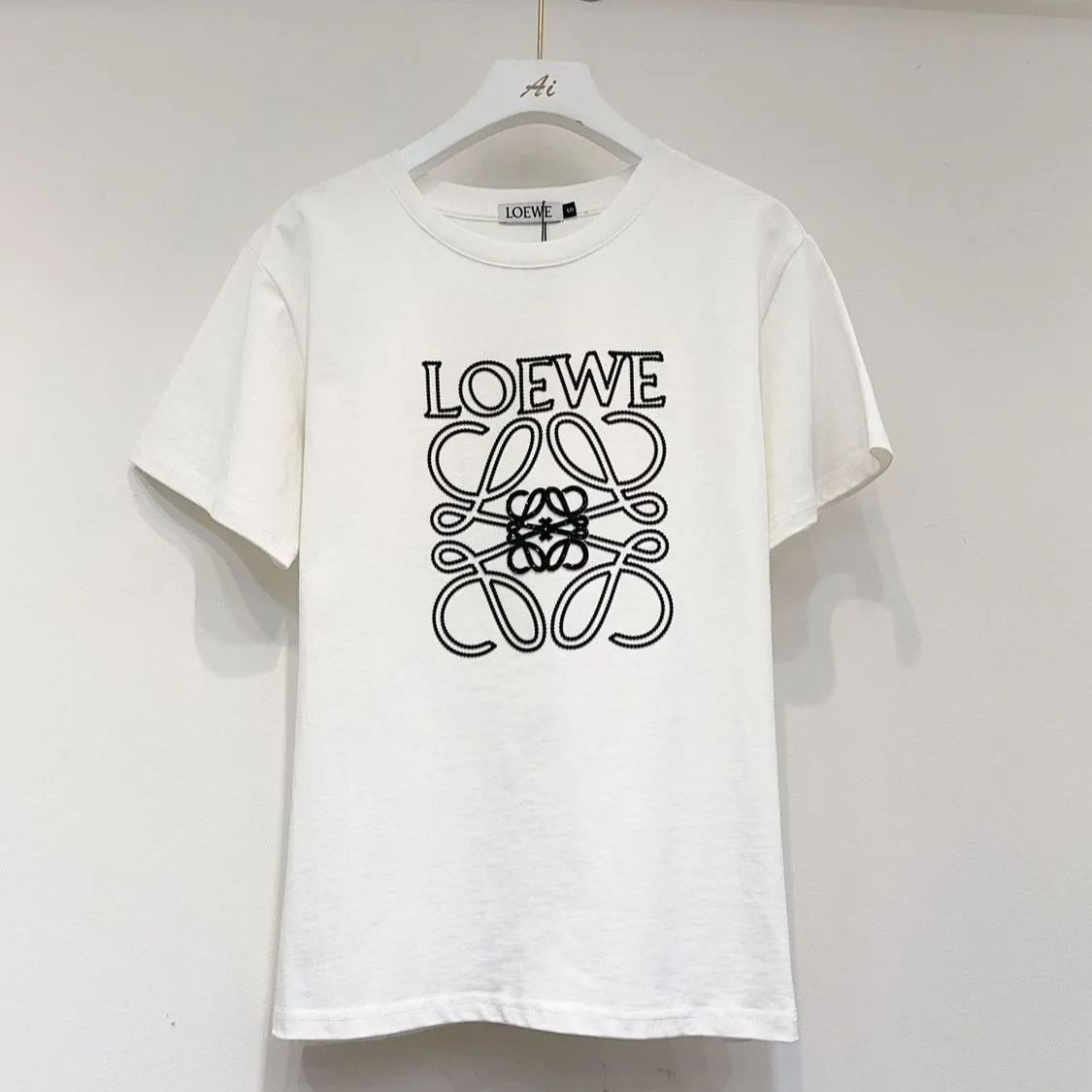 おしゃれなプリント柄のラウンドネック、ゆったりとしたカジュアルな半袖Tシャツトップス