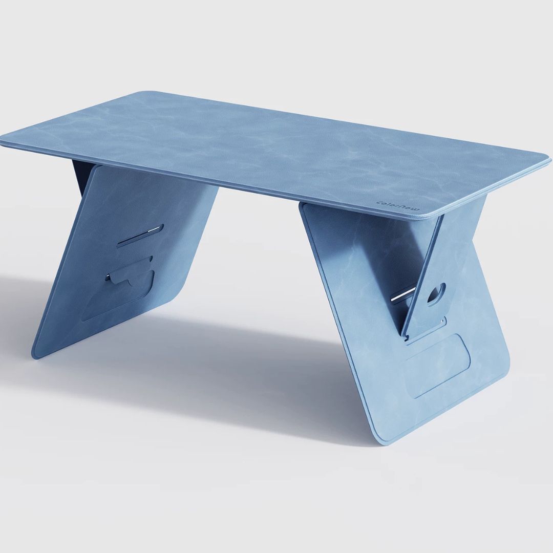 Blue leather folding lap desk on white background, three-quarter product view