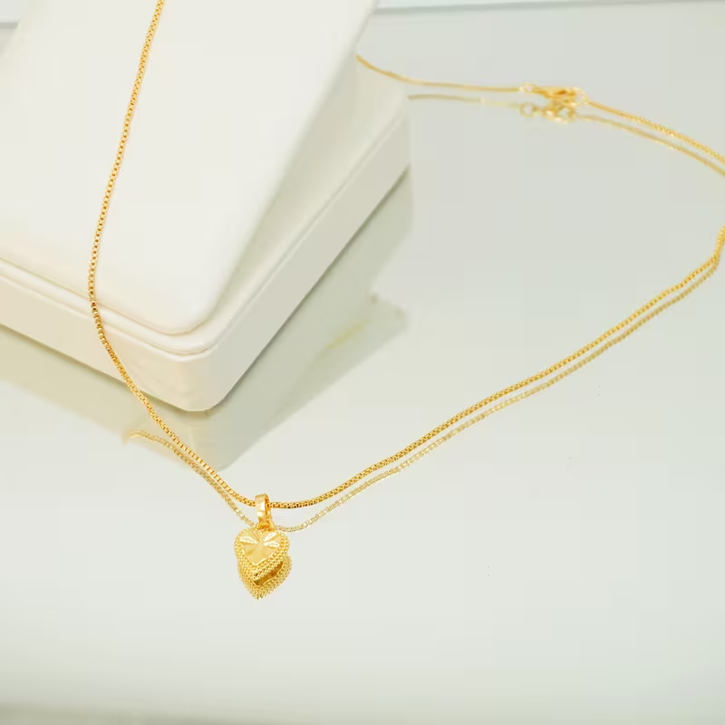 Gold-plated copper necklace with a heart-shaped pendant