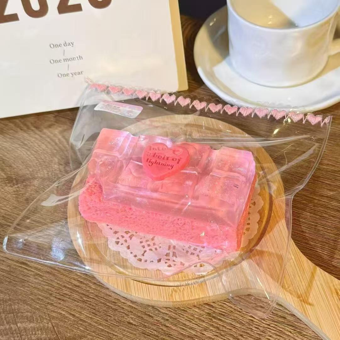 【ピンク／アイスブルーチョコ】シリコン製のスローリバウンド式ストレス解消グッズ（スクイーズタイプ）